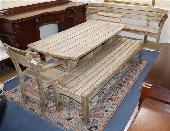 Gaze Burvill. An oak garden table, bench, low bench and pair of chairs Table L.170cm, Bench L.210cm, Low bench L.195cm